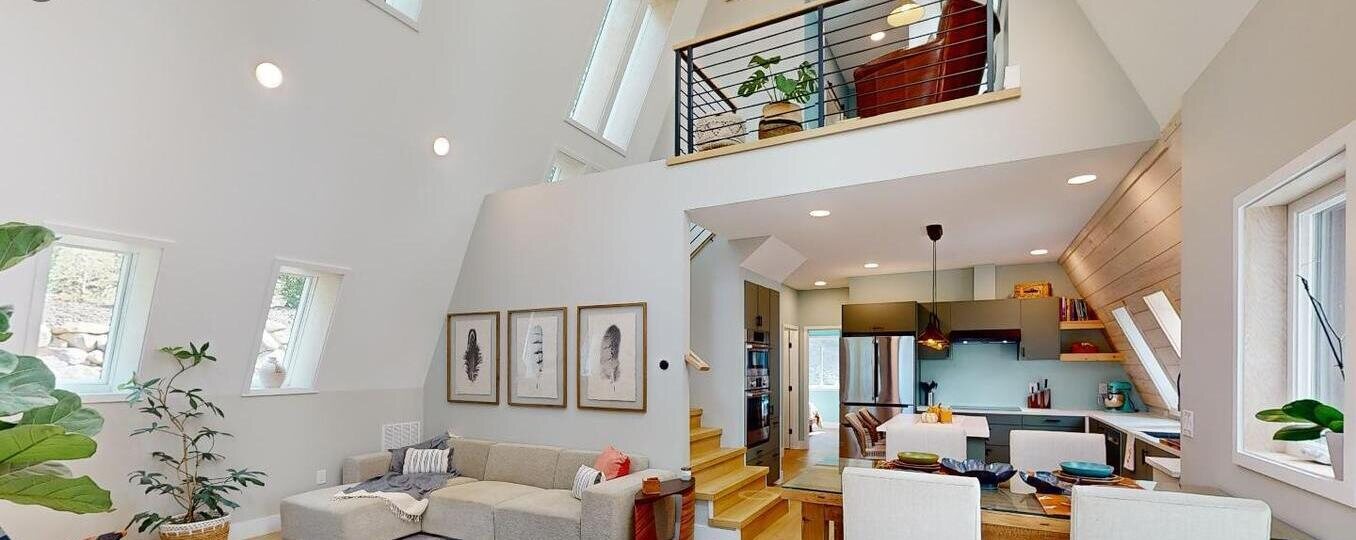 Vaulted great room with skylights & loft